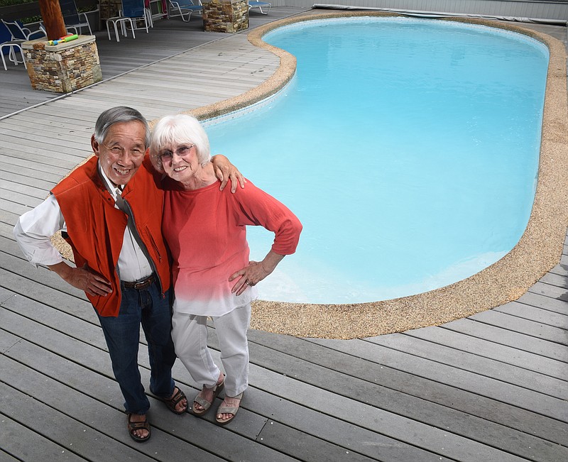Dr. and Mrs. Jackson Joe Yium enjoy their kidney shaped pool at their home on Signal Mountain. The Yium's have been married more than 50 years. Dr. Yium pioneered dialysis treatment in the Southeastern Tennessee area in the 1970s. 