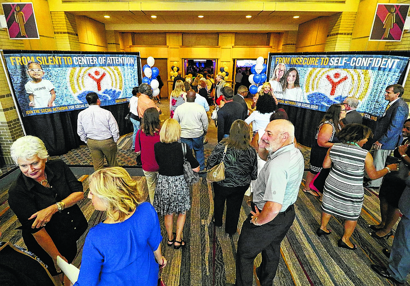 Staff Photo by Dan Henry / The Chattanooga Times Free Press- 8/23/16. Attendees arrive for the United Way of Greater Chattanooga's Campaign Kickoff at the Chattanooga-Hamilton County Trade and Convention Center on Tuesday, August 23, 2016. 