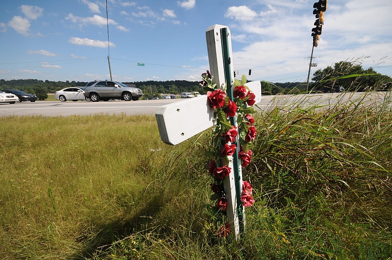 With the number of traffic fatalities up nationwide, memorial crosses like this one placed at the site of an East Brainerd crash may become more commonplace. But Chattanooga has actually seen a decrease in such deaths.