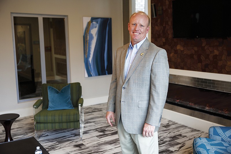 Developer Chris Curtis is photographed in the new Douglas Heights apartment building Friday, Aug. 19, 2016, in Chattanooga, Tenn. Residents have already begun moving in to the apartment building, which caters to UTC students.