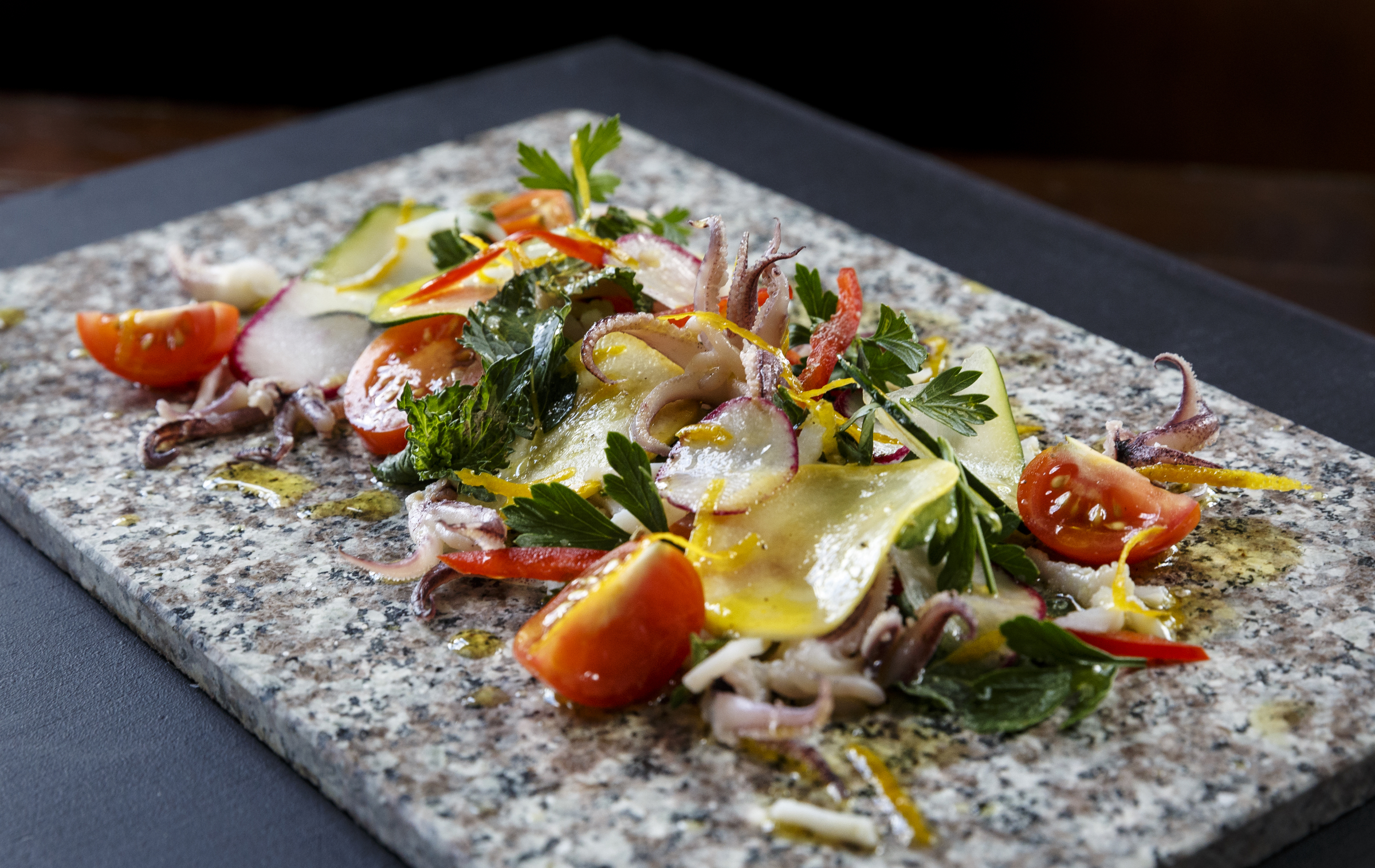 A squid salad dish created by chef William Buck Oglesby of the Back Inn Cafe is photographed Friday, Aug. 12, 2016, in Chattanooga, Tenn.