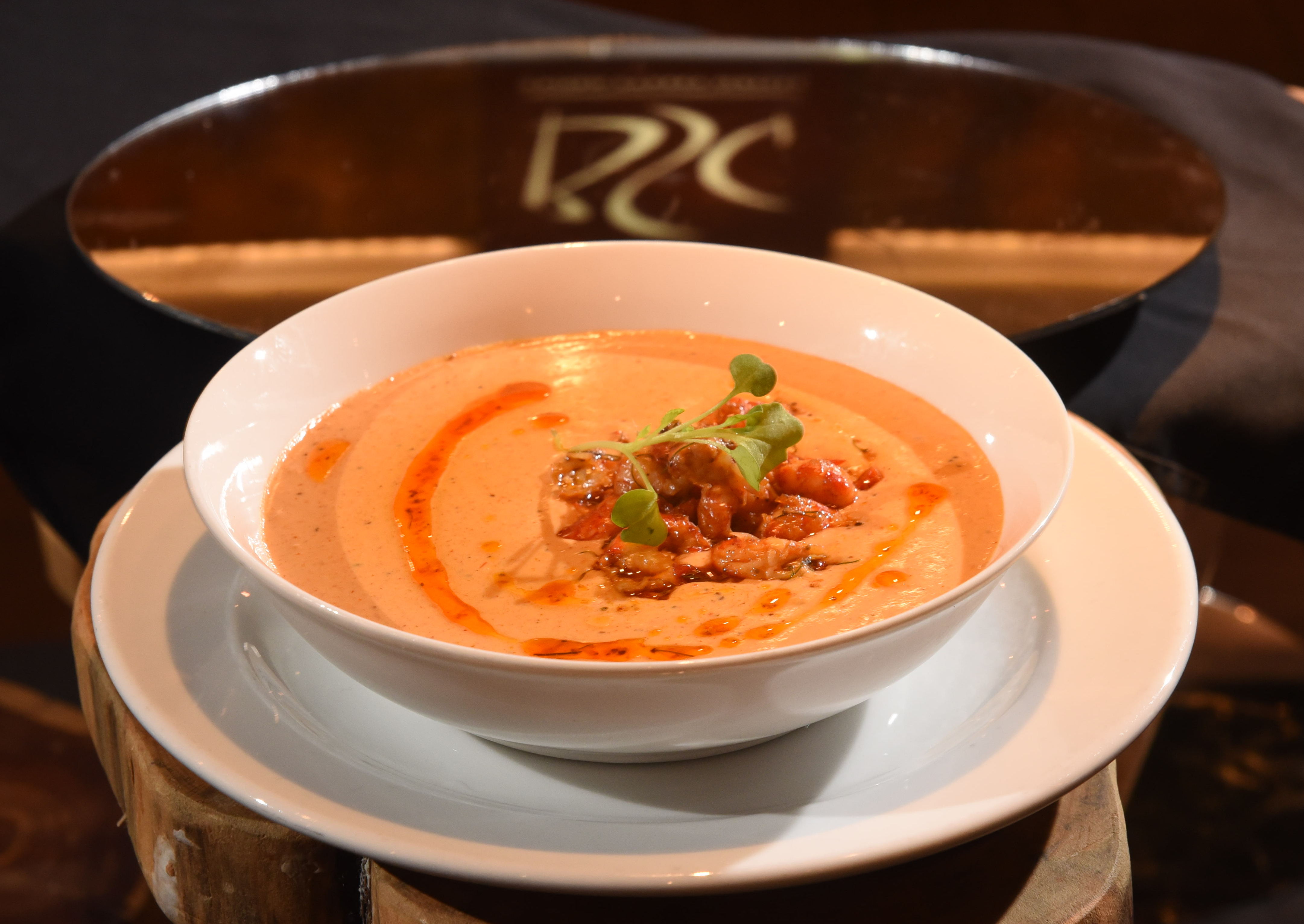 At the Broad Street Grill, Chef Adam Roe prepared this Crawfish Bisque with crawfish tail salad and fresh herbs.