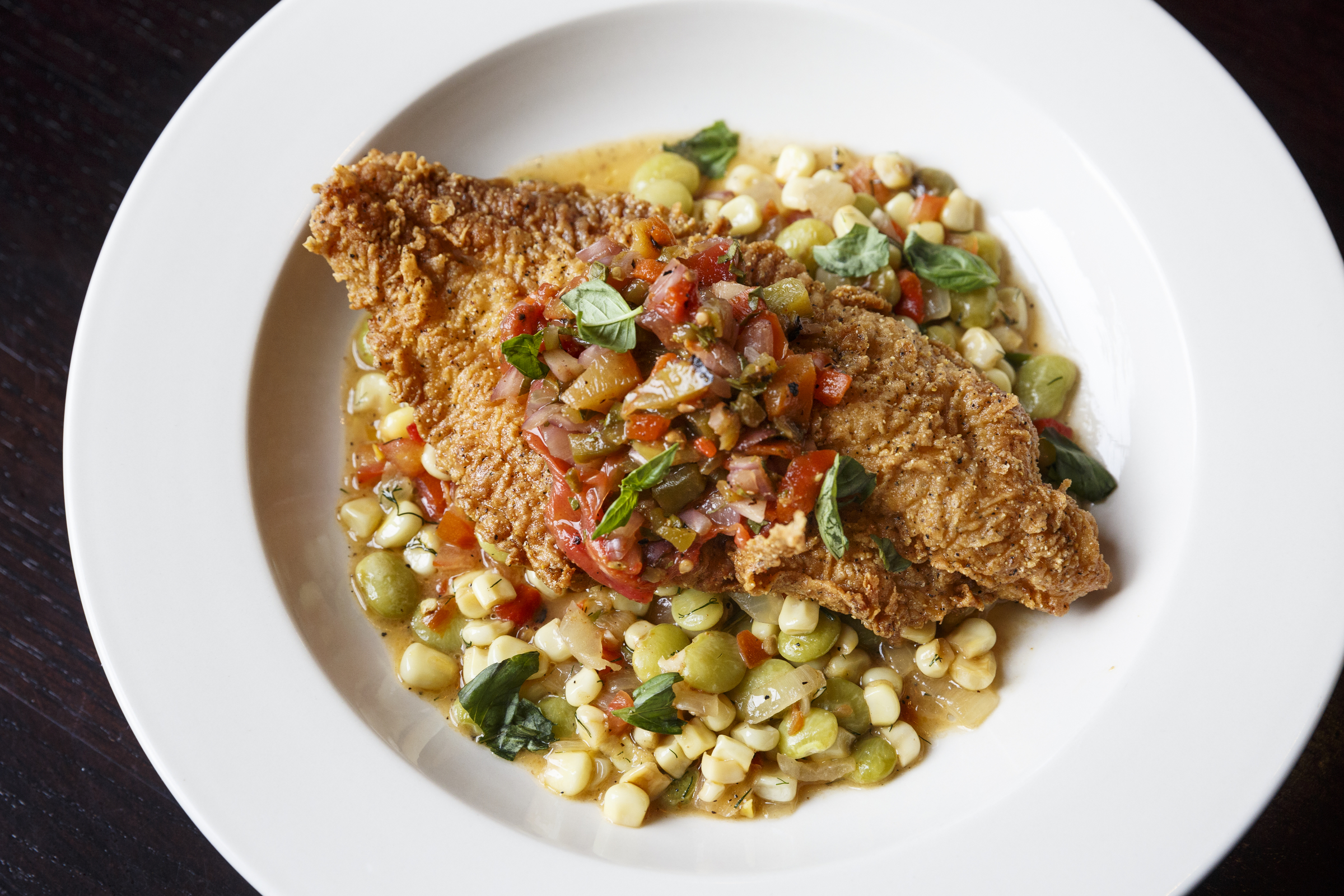 Feed Co. head chef Charlie Loomis will be serving a catfish dish at this year's Serve and Protect, photographed at the restaurant Thursday, Aug. 18, 2016, in Chattanooga, Tenn.