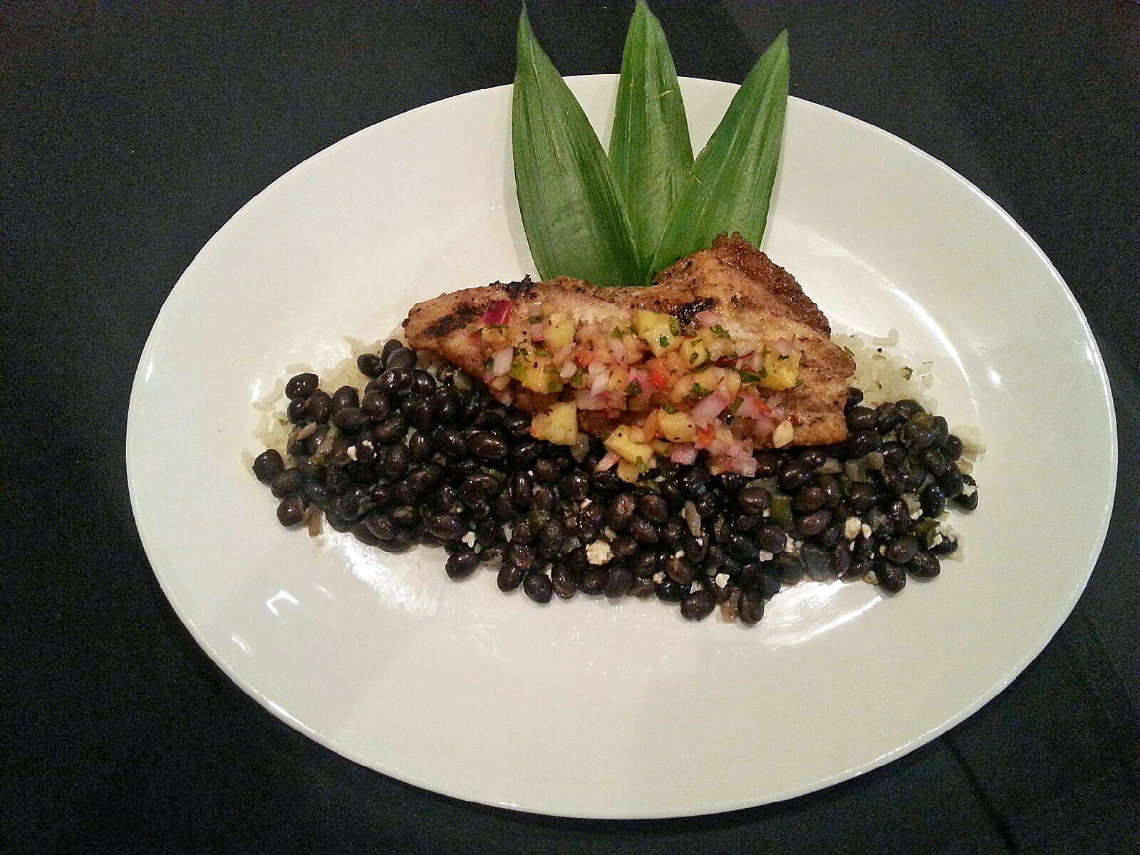 Jerk Catfish with Pineapple Salsa and Citrus Rice Pilaf from Bluewater Grille.