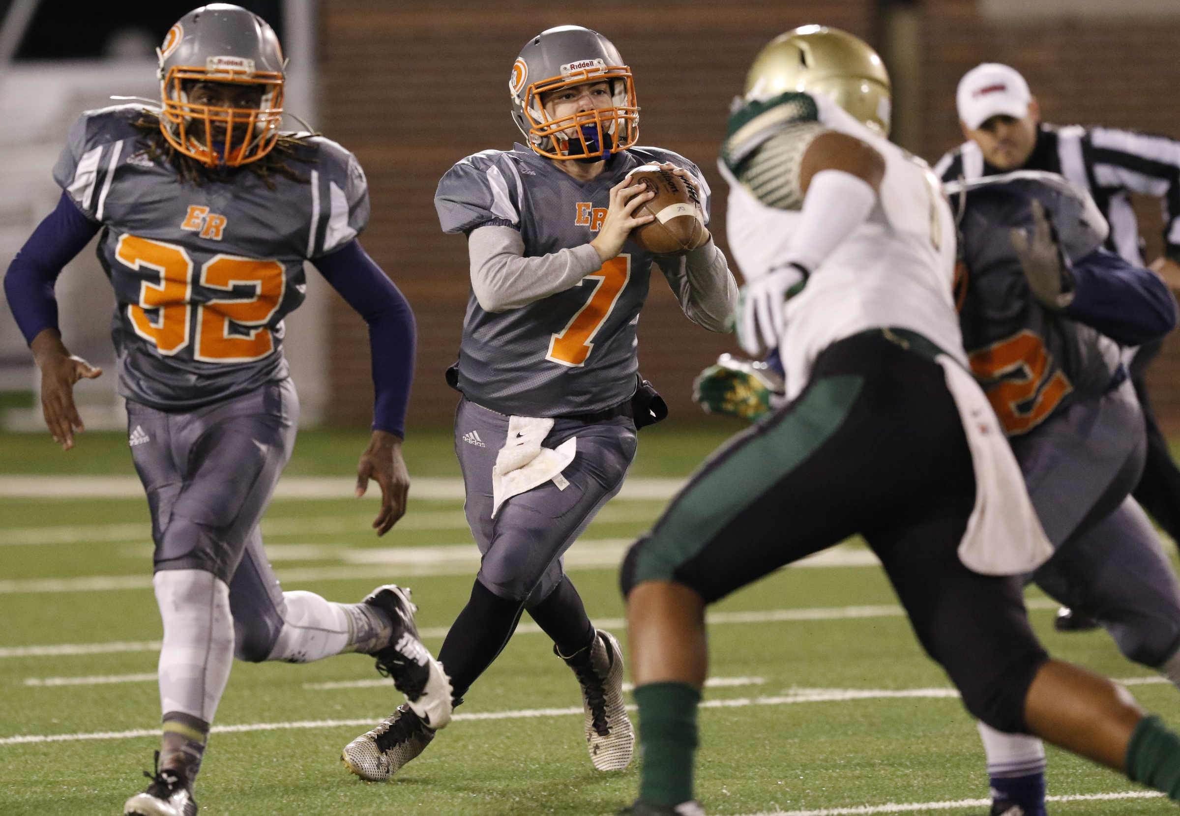 *Staff Photo by Dan Henry / The Chattanooga Times Free Press- 11/20/15. East Ridge quarterback Eric Bennett (7) looks for an open player while battling Notre Dame during Friday's quarterfinal playoff game on November 20, 2015.