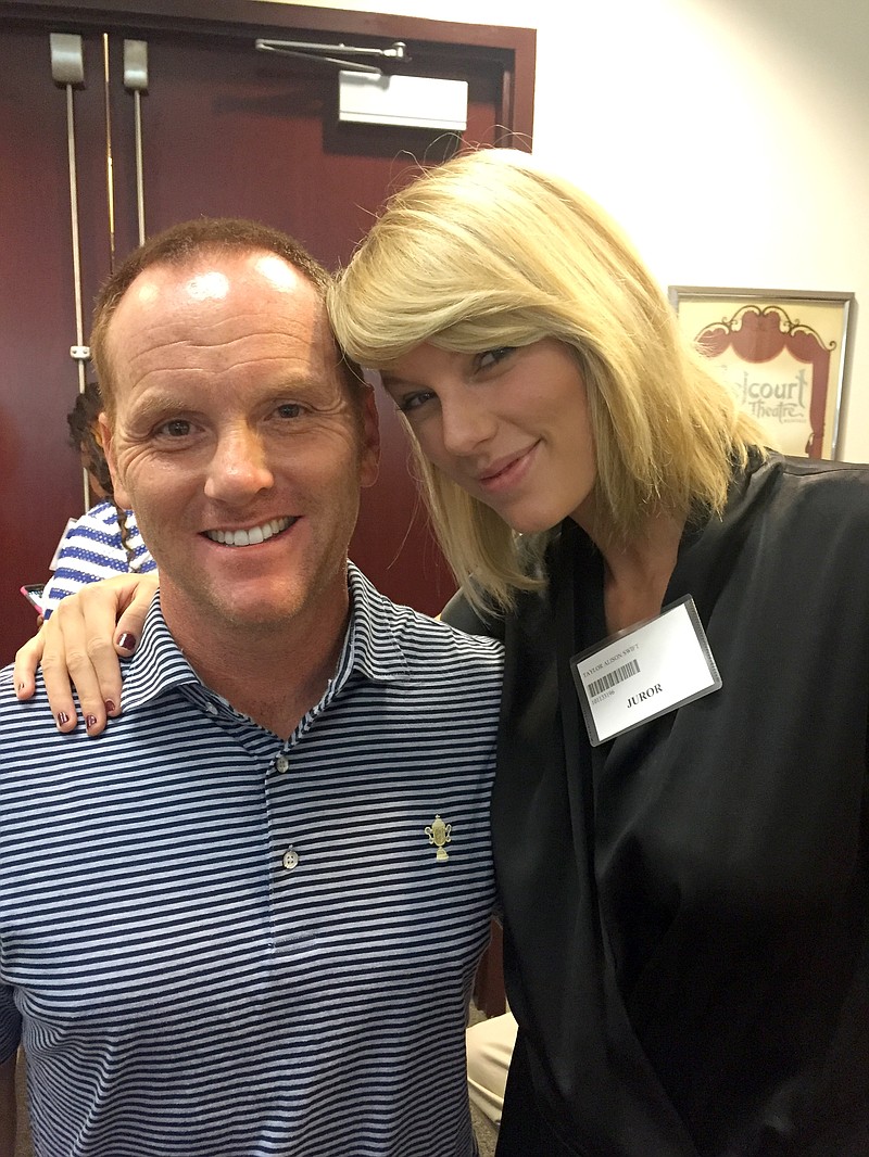 
              In this image provided by Bryan Merville, potential juror pop star Taylor Swift, right, poses for a photo with Bryan Merville in a courthouse waiting area in Nashville, Tenn., Monday, Aug. 29, 2016. A Nashville judge dismissed Swift as a potential juror in an aggravated rape and kidnapping case. Merville was dismissed as a potential juror in a separate case. Merville, who owns a technology infrastructure company, said he took a photo with Swift for his daughters, who are huge fans. (Bryan Merville via AP)
            