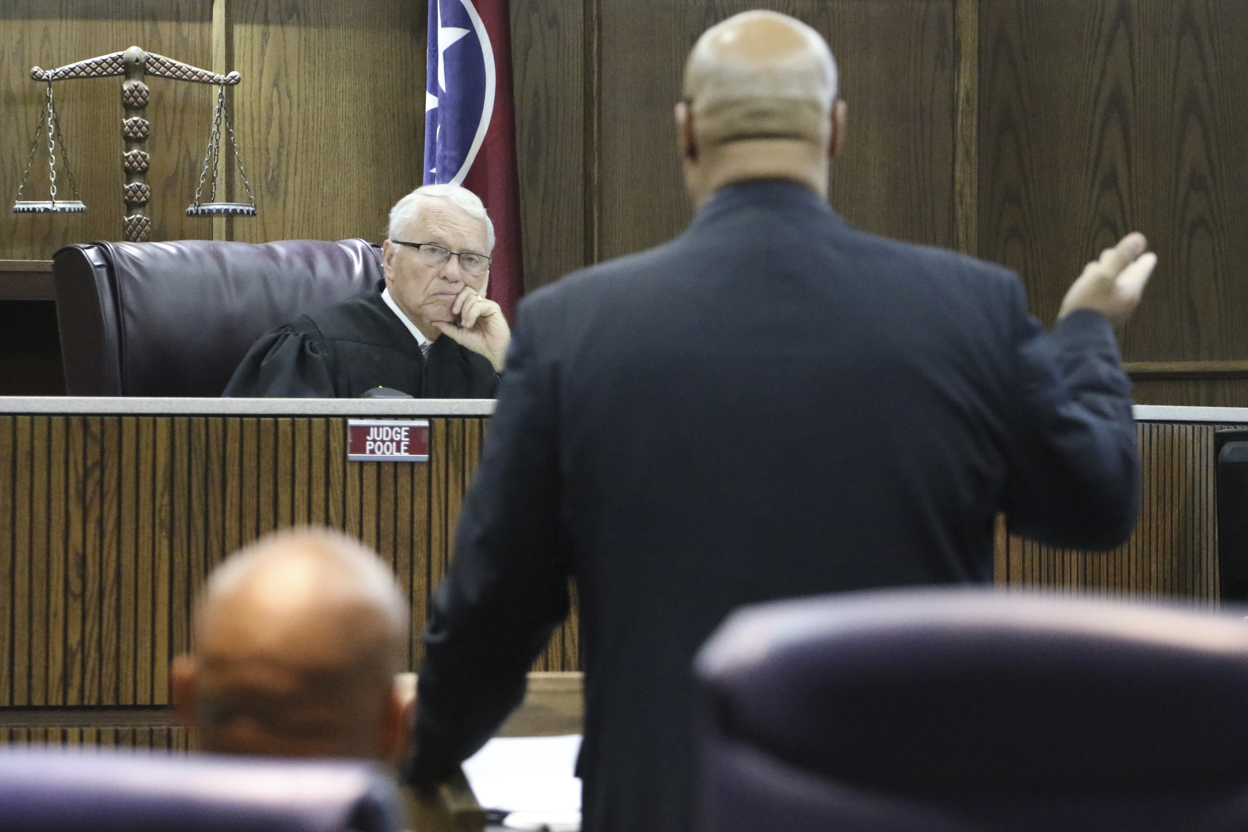 Staff Photo by Dan Henry / The Chattanooga Times Free Press- 8/31/16. Attorney Curtis Bowe, right, argues that his client, former Ooltewah High School head basketball coach Andre "Tank" Montgomery, should have charges of failure to report child sexual abuse thrown out while appearing before Judge Don Poole on August 31, 2016.
