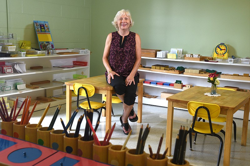 Bobbe Spink, founder and head of The Montessori School, sits in a classroom Wednesday. Spink will be retiring next year.