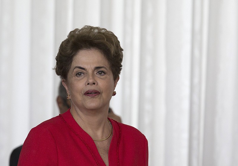 
              Brazil's ousted President Dilma Rousseff arrives for her speech at the official residence of the president, Alvorada Palace in Brasilia, Brazil, Wednesday, Aug. 31, 2016. In her first remarks after being ousted as Brazil's president, Rousseff is vowing to form a strong opposition front against the new government. saying, "They think that they beat us, but they are wrong." she said. (AP Photo/Leo Correa)
            