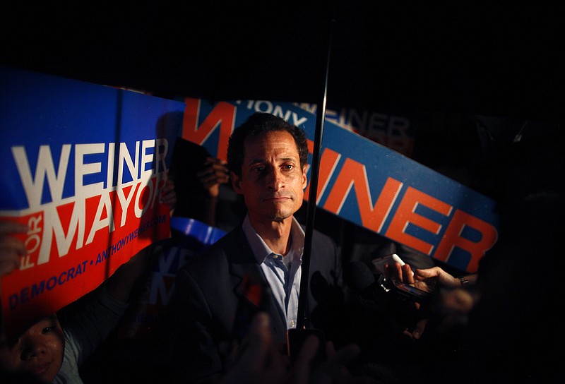 Anthony Weiner speaks to reporters in New York in August 2013.