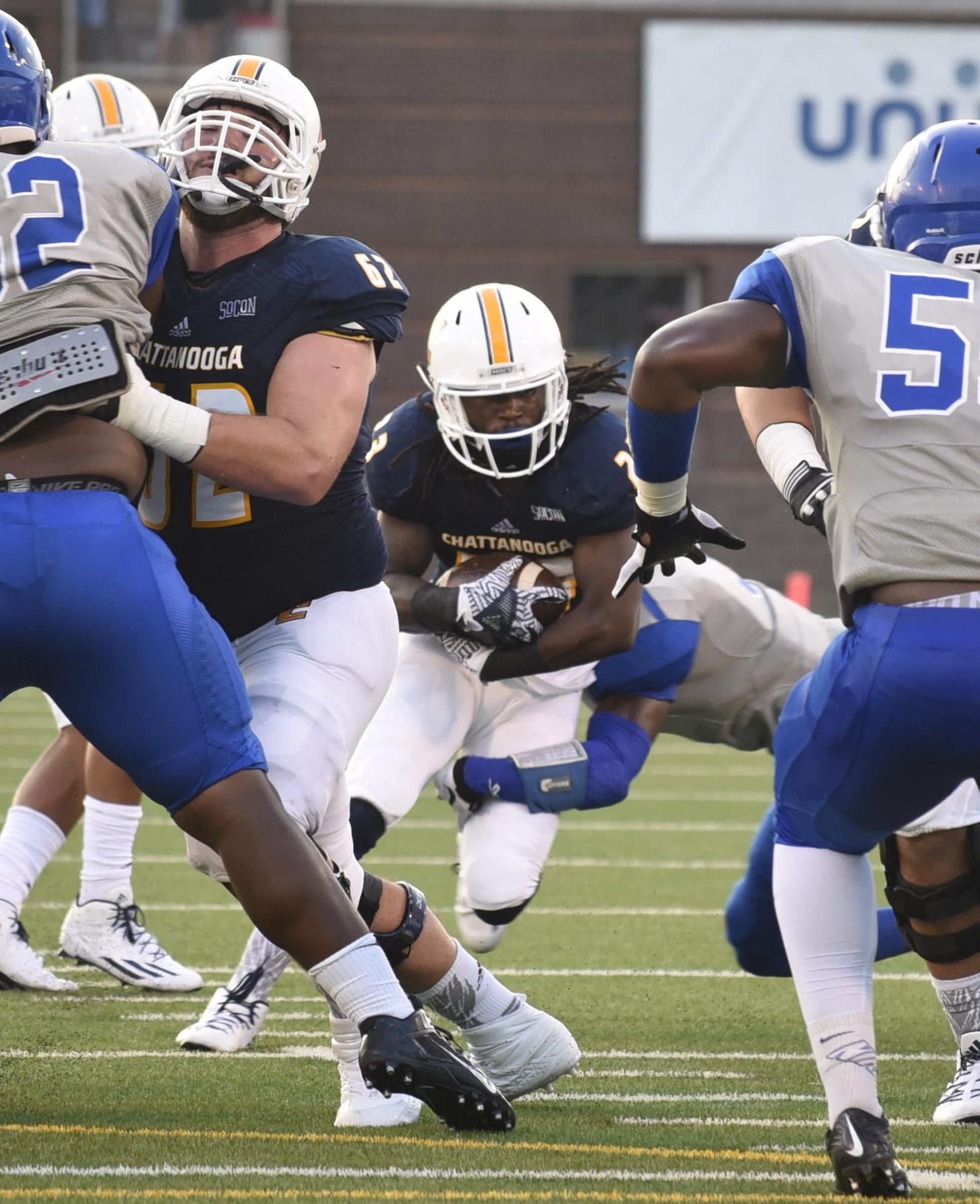 UTC's Richardre Bagley (23) looks for a opening while Corey Levin (62) blocks. The University of Tennessee/Chattanooga Mocs hosted the Shorter University Hawks in NCAA football action on Sept. 1, 2016.