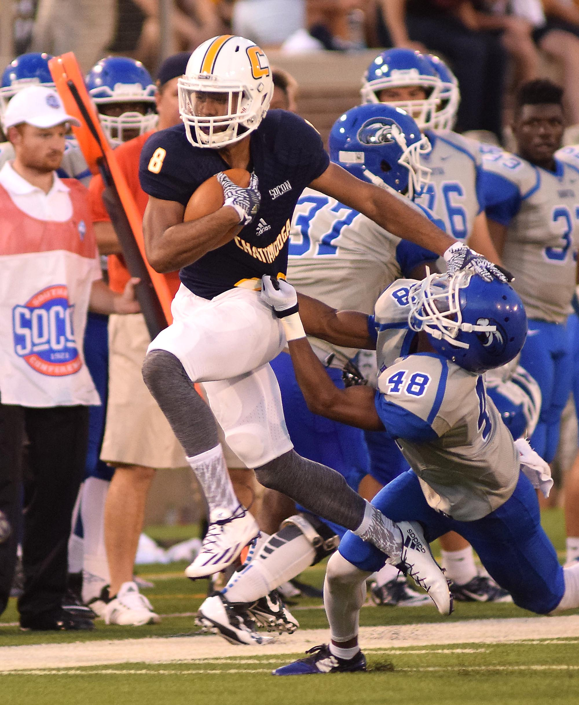 UTC's C.J. Board (8) breaks the tackle of Shorter's Joshua Duncan (48). The University of Tennessee/Chattanooga Mocs hosted the Shorter University Hawks in NCAA football action on Sept. 1, 2016.