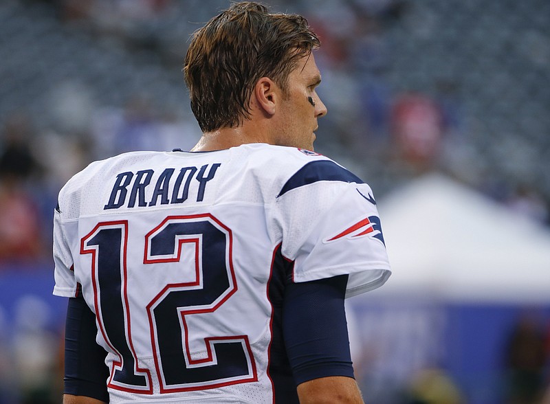 
              New England Patriots quarterback Tom Brady watches his team warm up before a preseason NFL football game against the New York Giants on Thursday, Sept. 1, 2016, in East Rutherford, N.J. (AP Photo/Kathy Willens)
            