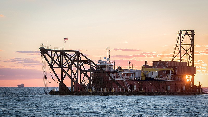 The 300 foot dredge Alaska, off the coast of Tybee Island, Ga., deepens the shipping channel to the Port of Savannah. The project will deepen the shipping channel from 42 to 47 feet at mean low water.