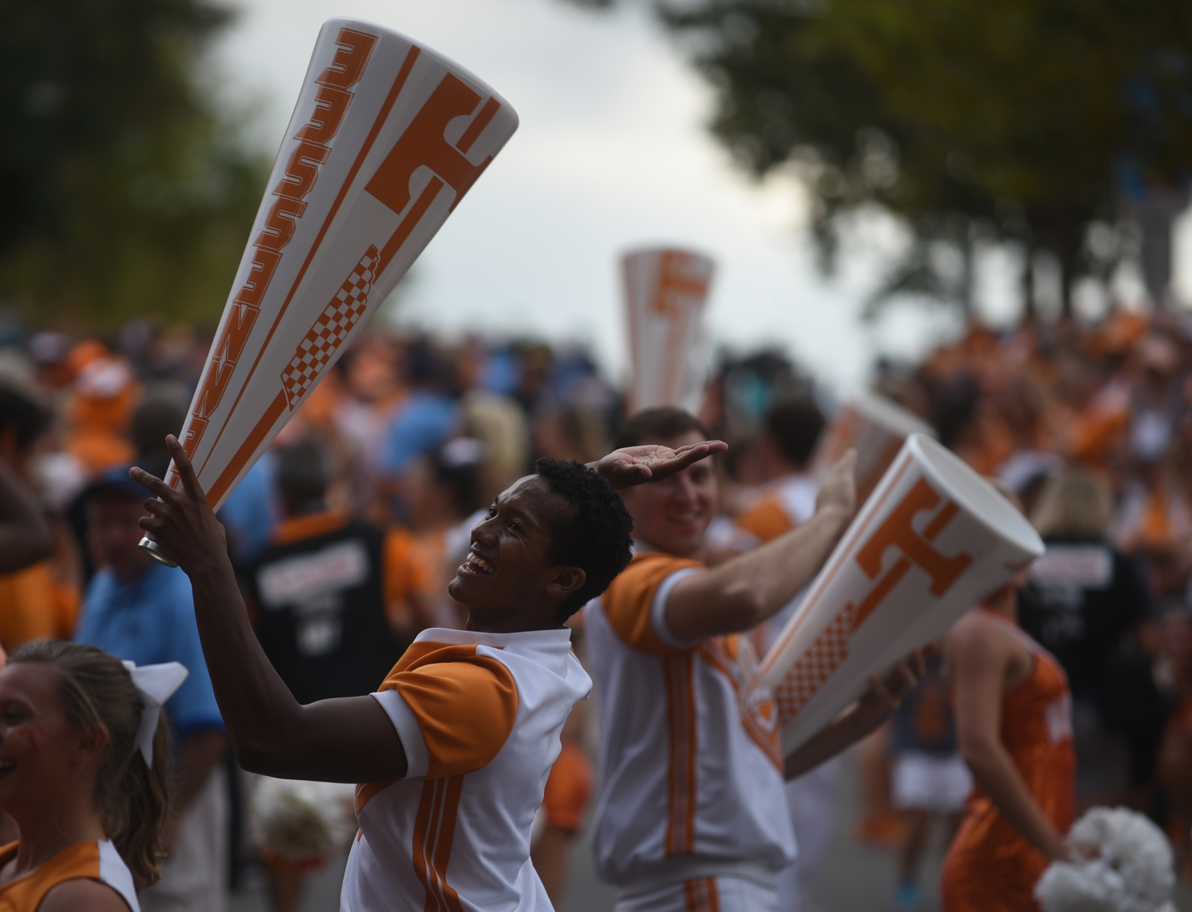 Cheerleaders interact with the crowd before the Vol Walk Thursday, Sept. 1, 2016 outside of Neyland Stadium before the game against Appalachian State.