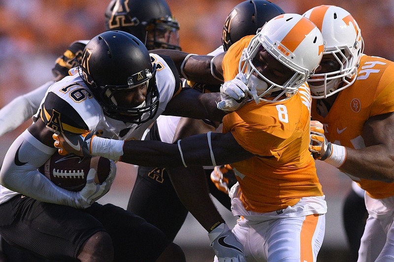 UT's Justin Martin (8) tackles Appalachian State's Jaquil Capel (16) Thursday, Sept. 1, 2016, in Neyland Stadium.