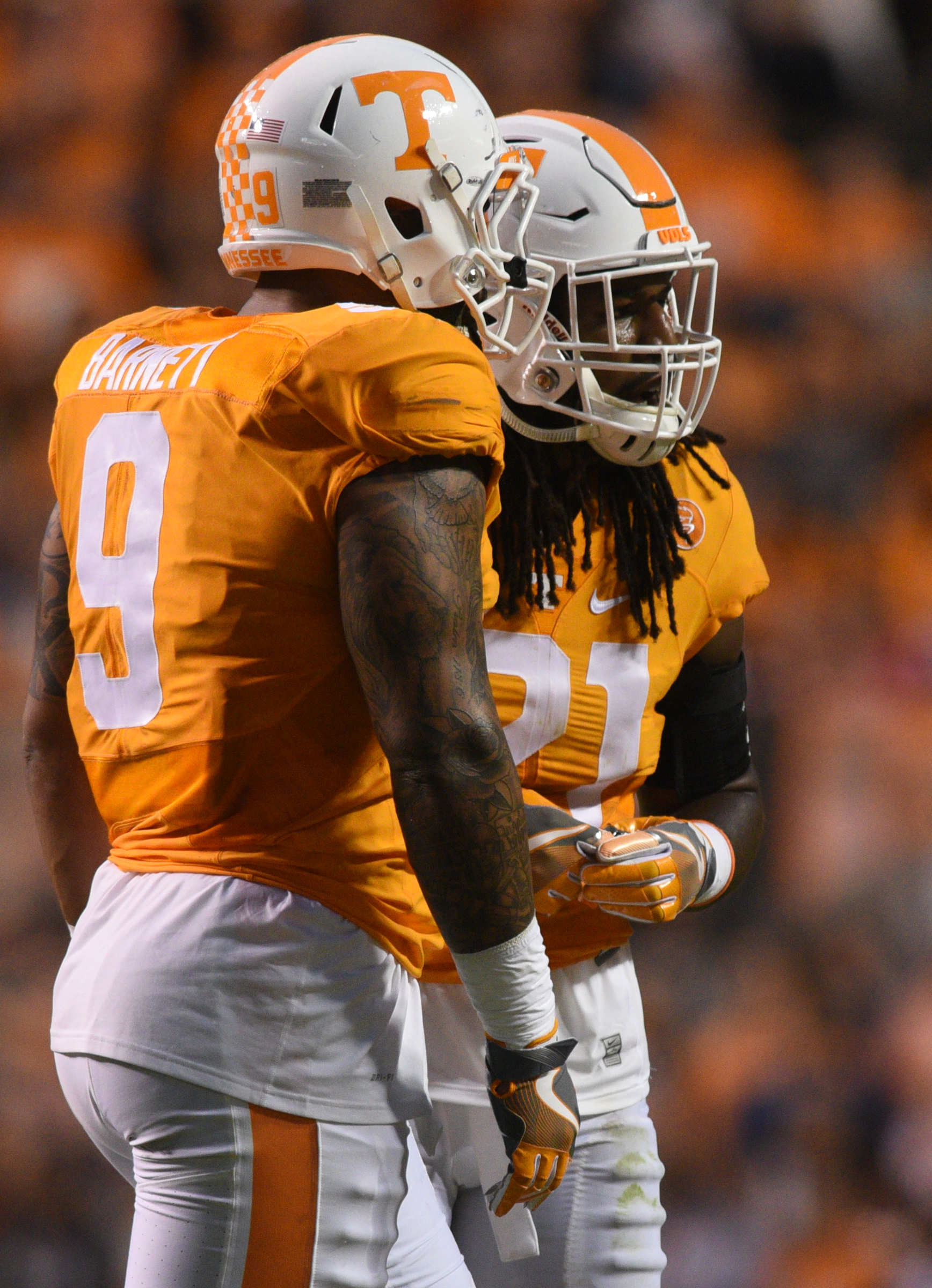 UT's Jalen Reeves-Maybin (21) waits with Derek Barnett to hear his fate after a targeting call against him in the game against Appalachian State Thursday, Sept. 1, 2016 in Neyland Stadium.