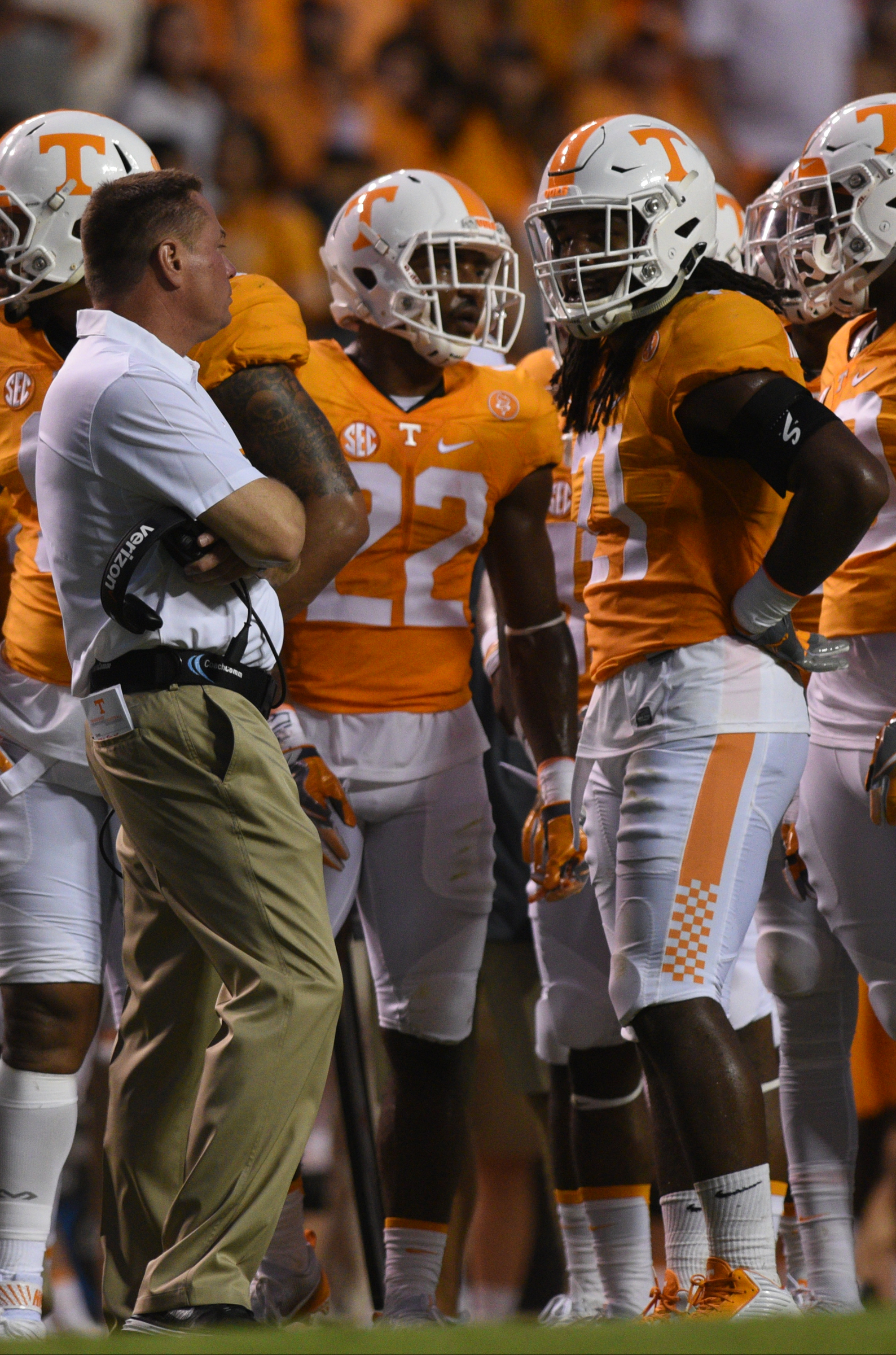 UT's Jalen Reeves-Maybin, right, talks with coach Butch Jones while waiting on the decision about a targeting call against him in the game against Appalachian State Thursday, Sept. 1, 2016 in Neyland Stadium.