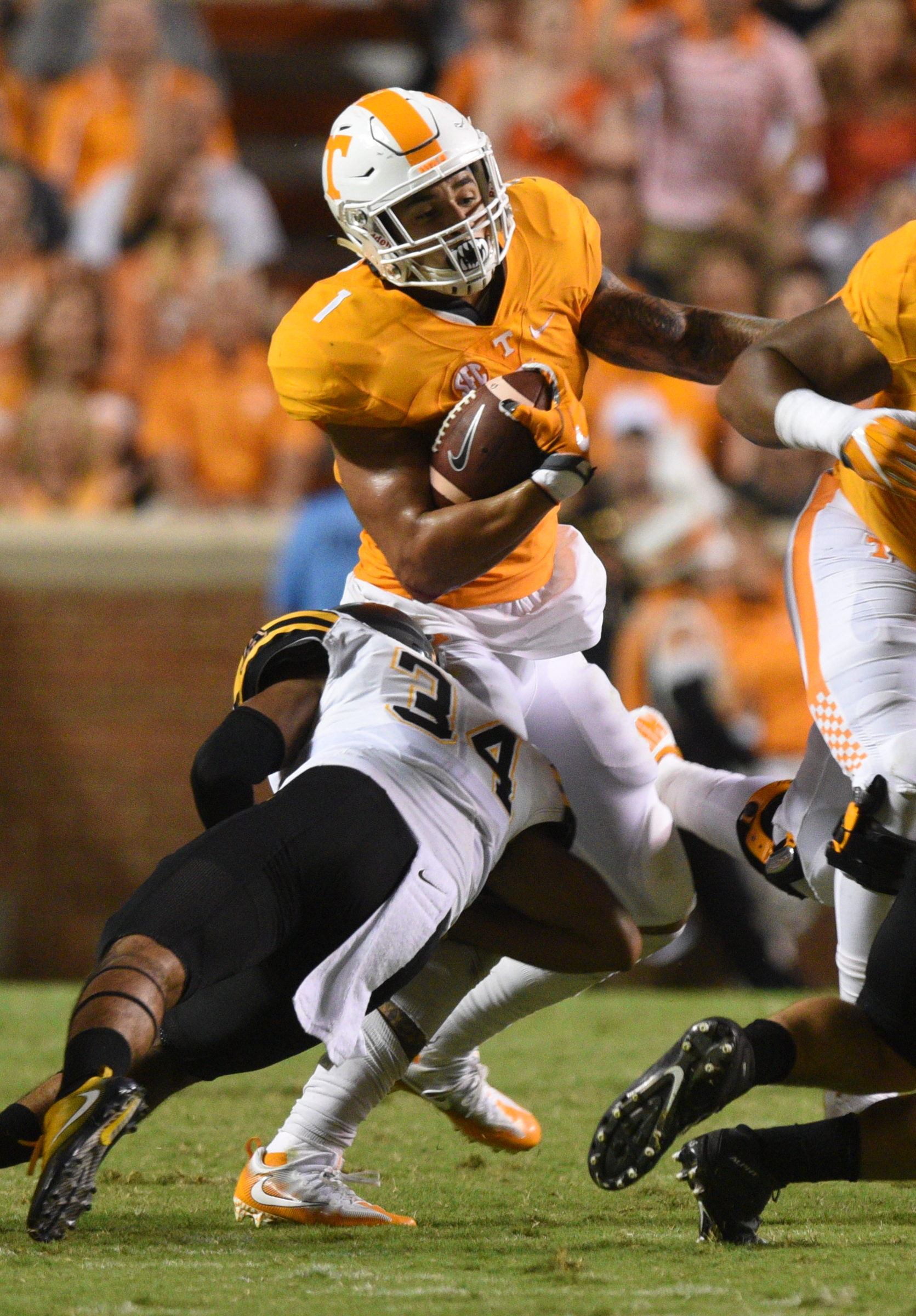 UT's Jalen Hurd is tackled by Appalachian State's Appalachian State defensive back Desmond Franklin (34) Thursday, Sept. 1, 2016 in Neyland Stadium.