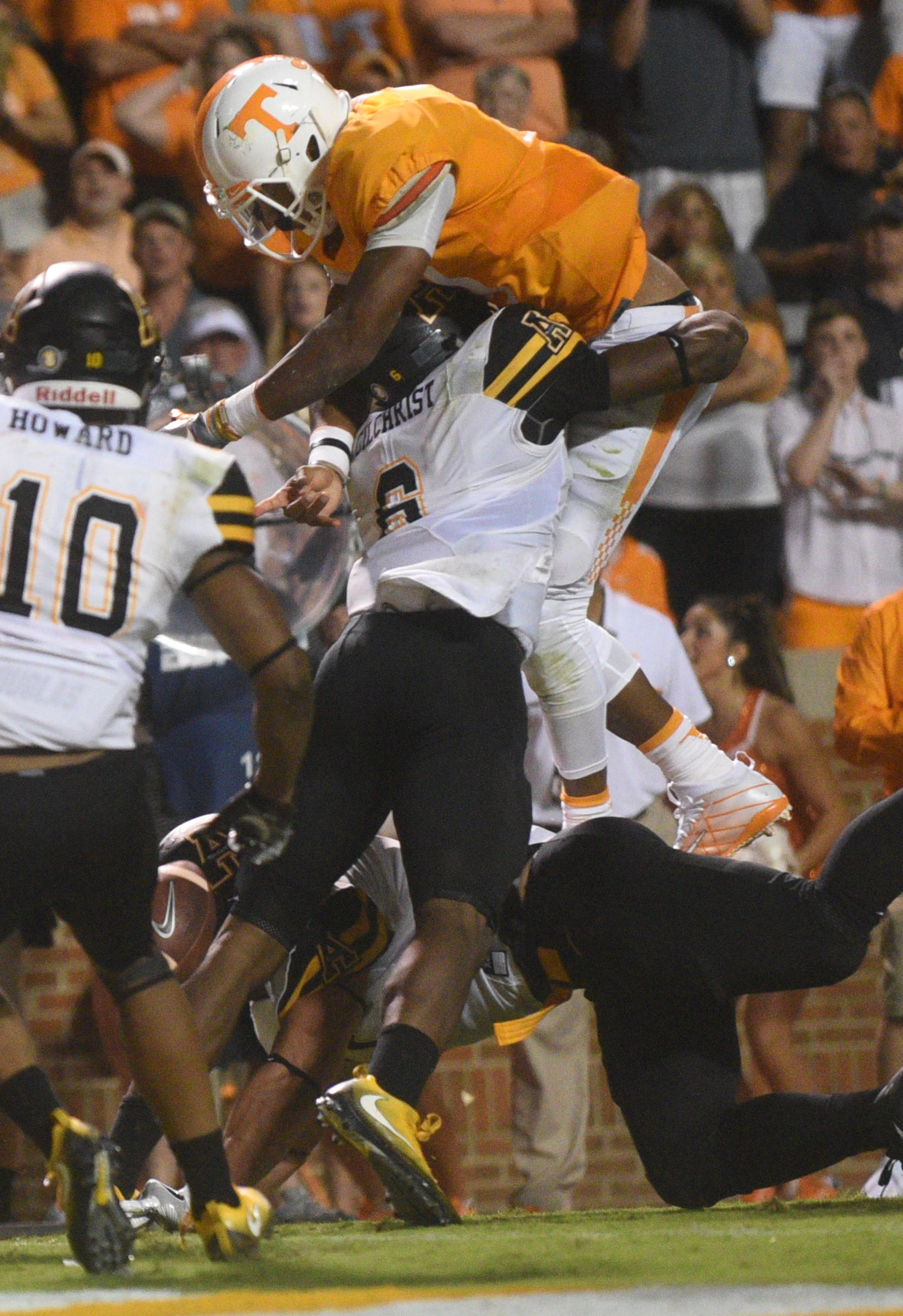 UT quarterback Joshua Dobbs carries toward the goal line in overtime, but fumbles the ball. It was recovered by Jalen Hurd, who scored the winning touchdown in the gam against Appalachian State Thursday, Sept. 1, 2016 in Neyland Stadium.