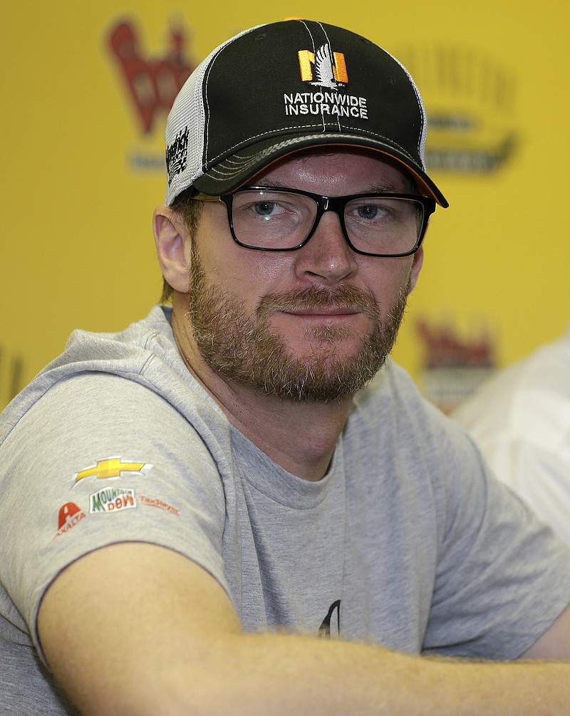 
              Dale Earnhardt Jr. listens to a question during his news conference before the NASCAR Sprint Cup Series auto race at Darlington Raceway, Sunday, Sept. 4, 2016, in Darlington, S.C. (AP Photo/Terry Renna)
            