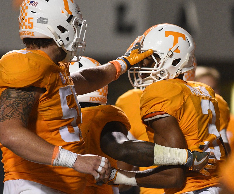UT's Coleman Thomas (55) congratulates receiver Josh Malone after he scored a touchdown in the fourth quarter of the game against Appalachian State Thursday, Sept. 1, 2016 in Neyland Stadium.