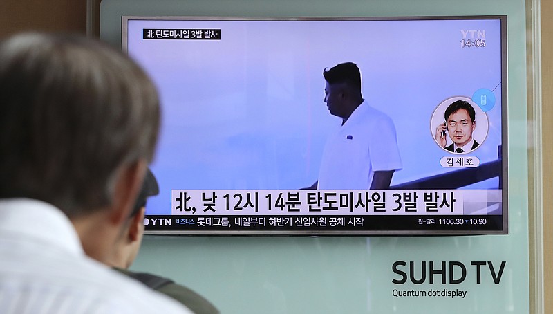 
              A man watches a TV news program showing a file image of North Korean leader Kim Jong Un while reporting about the North's missile launch, at the Seoul Train Station in Seoul, South Korea, Monday, Sept. 5, 2016. North Korea fired three ballistic missiles off its east coast Monday, South Korea's military said, in a show of force timed to the G-20 economic summit in China. The letters on the screen read: "North Korea fired three ballistic missiles." (AP Photo/Lee Jin-man)
            