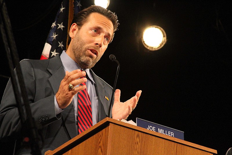 
              FILE - In this Aug. 10, 2014, file photo, then-Republican U.S. Senate candidate Joe Miller speaks during a debate in Anchorage, Alaska. Miller announced Tuesday, Sept. 6, 2016, that he is running for U.S. Senate as a Libertarian after losing U.S. Senate races in Alaska in 2010 and 2014 as a Republican. (AP Photo/Mark Thiessen, File)
            