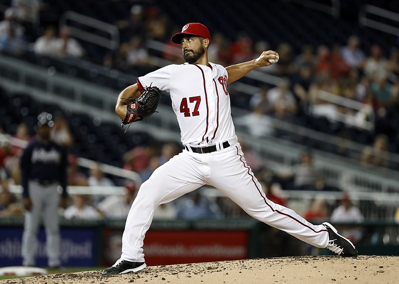 Washington Nationals starting pitcher Gio Gonzalez throws during the third inning of a baseball game against the Atlanta Braves at Nationals Park, Tuesday, Sept. 6, 2016, in Washington.