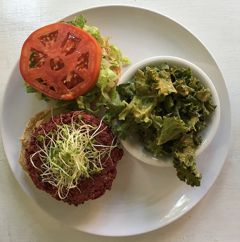 Try Cashew's Beet Burger, a mild offering, with a side dish of garlicky kale.