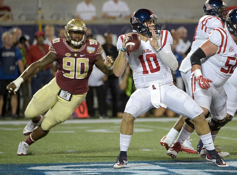 Ole Miss quarterback Chad Kelly threw four touchdown passes Monday night against Florida State in Orlando, but he also was intercepted three times in a 45-34 loss.