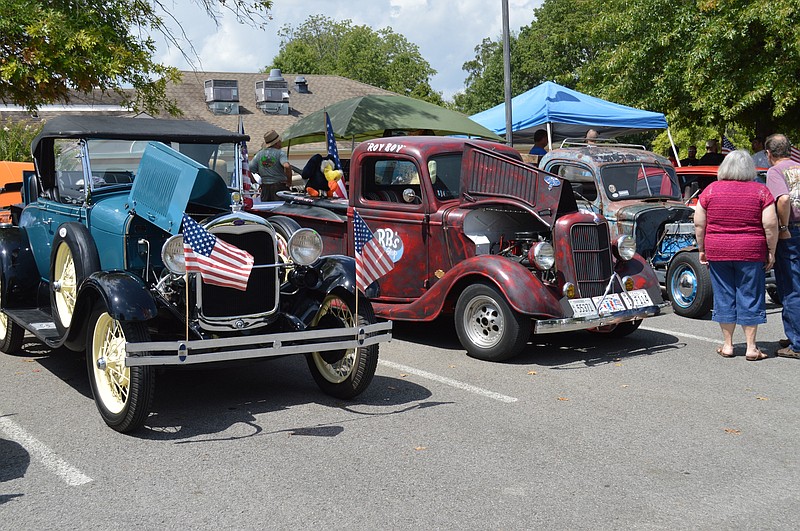 Antique cars line up at a previous car show benefiting the Al Millard Memorial Stocking Full of Love.