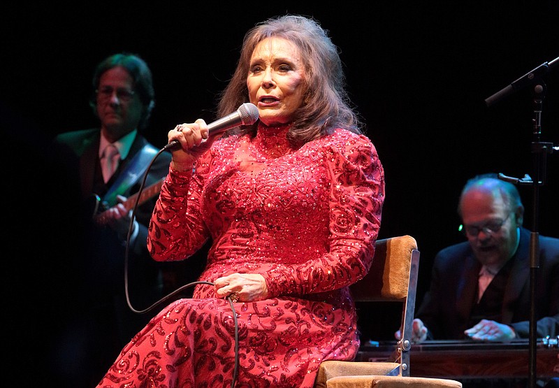 
              FILE - In this Aug. 28, 2016 file photo, Loretta Lynn performs in concert at the American Music Theater in Lancaster, Pa. Lynn has postponed shows after suffering injuries in a fall that will require minor surgery. Her injuries were described as not serious, but a statement posted on her website on Wednesday, Sept. 7, said her doctors have advised her to stay off the road until she’s made a full recovery.  (Photo by Owen Sweeney/Invision/AP, File)
            