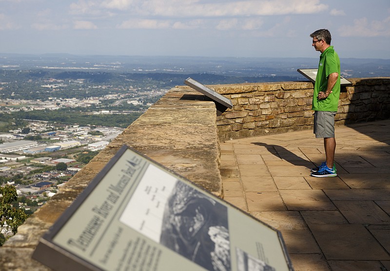 Below, Peter Ancil looks out across Moccasin Bend from an observation point at Point Park.