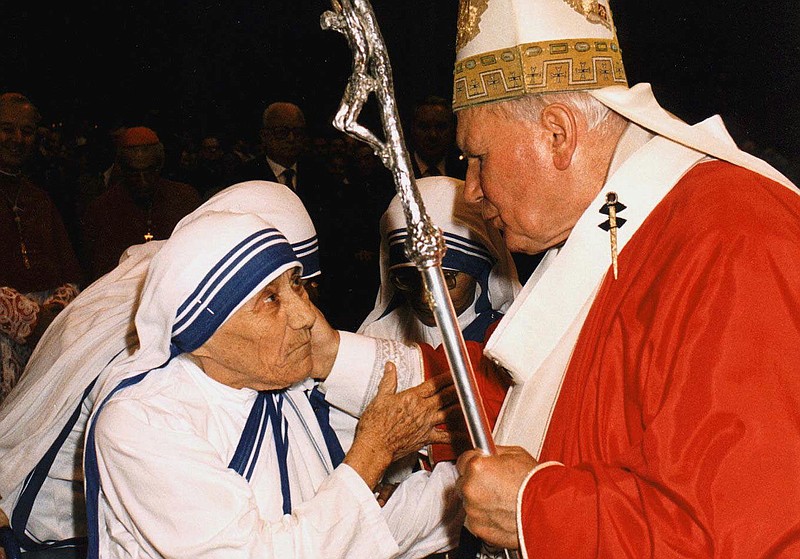 Then-Pope John Paul II greets Mother Teresa of Calcutta at St. Peter's Basilica at the Vatican in 1997.