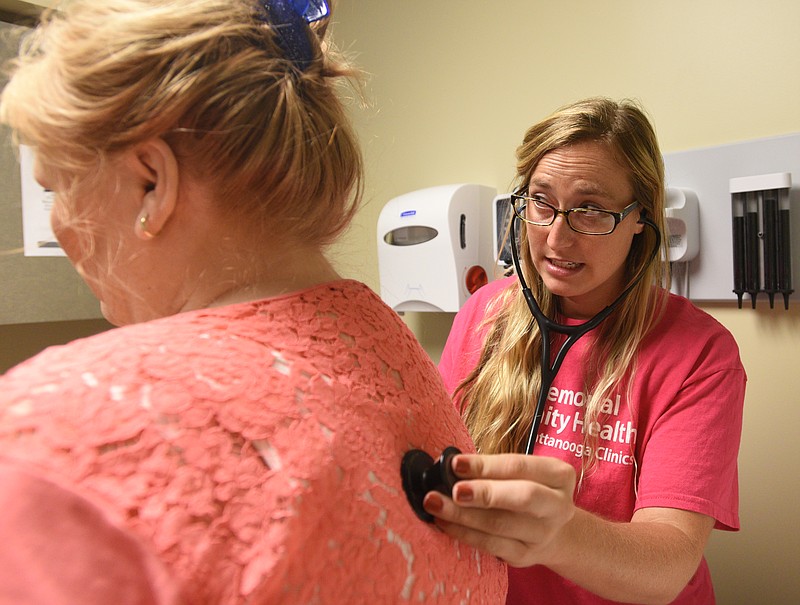 Nurse Practioner Amy Covington examines Carolyn Hass Friday, Sept. 2, 2016 at CHI Memorial Community Health in Hixson.