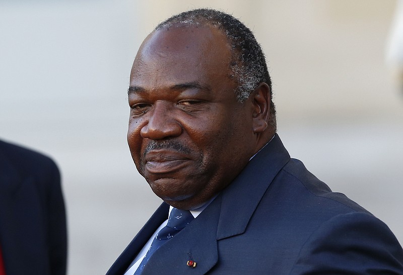 
              FILE-In this file photo taken on Tuesday, Nov. 10, 2015, Gabon's President Ali Bongo Ondimba, leaves the Elysee Palace after a meeting with French President Francois Hollande as part of preparation of the upcoming COP21 Climate Conference in Paris, France. President   Ondimba on Wednesday Sept. 7, 2016  tried to deflect European Union observers' findings of a voting anomaly in his stronghold province that pushed him over the edge to win re-election, accusing his lead opponent of ballot fraud and a plot to seize power. (AP Photo/Francois Mori, File)
            