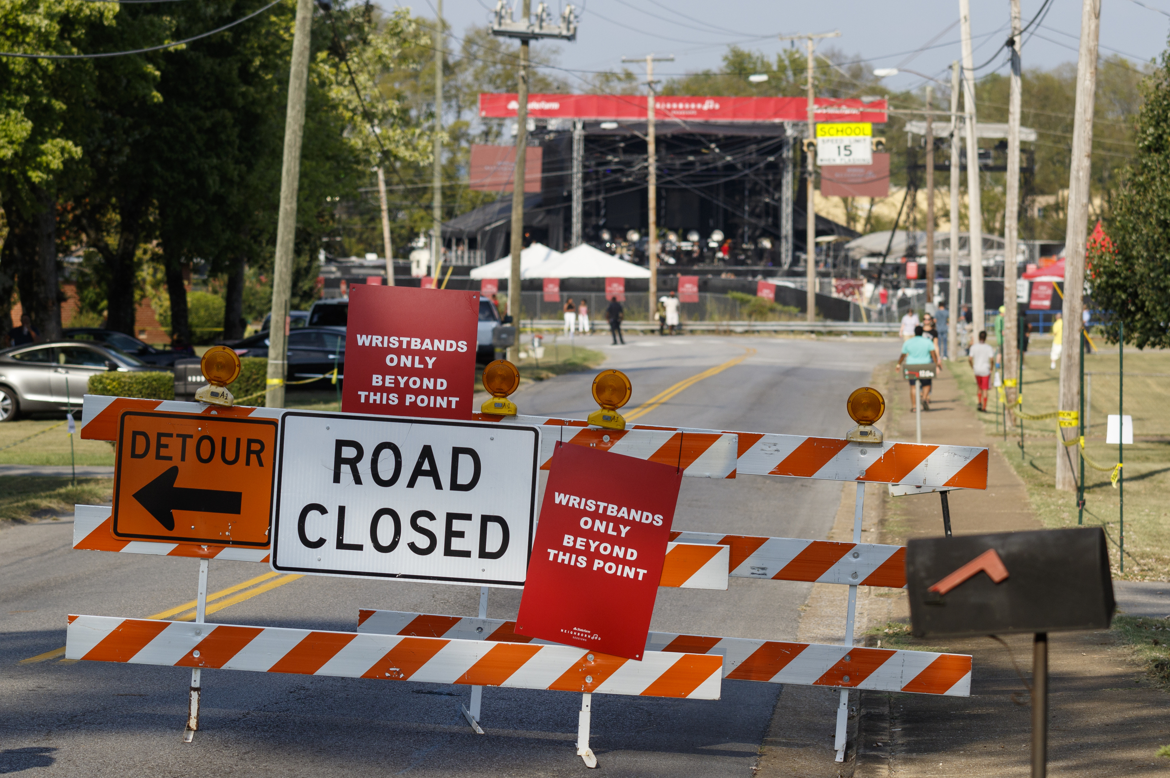 A sign indicates that Shallowford Road is closed before a performance by artist Usher at Dalewood Middle School, his former school, on Friday, Sept. 9, 2016, in Chattanooga, Tenn. The concert concluded a string of activities and benefits by the artist in his home town.