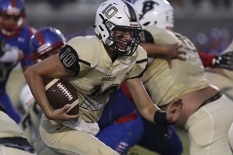 Staff Photo by Dan Henry / The Chattanooga Times Free Press- 9/9/16. Bradley Central's Cole Copeland (10) runs the ball against Cleveland during the first half of play at the Blue Raiders' home field on Friday, September 9, 2016. 