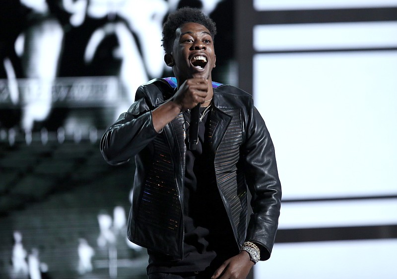 
              FILE - In this June 26, 2016 file photo, Desiigner performs at the BET Awards in Los Angeles. Authorities say the rapper has been arrested for brandishing a handgun at another motorist and having drugs in a car. Police said Friday, Sept. 9, that the “Panda” performer was pulled over Thursday night in midtown Manhattan following a road rage dispute in the Lincoln Tunnel. (Photo by Matt Sayles/Invision/AP, File)
            