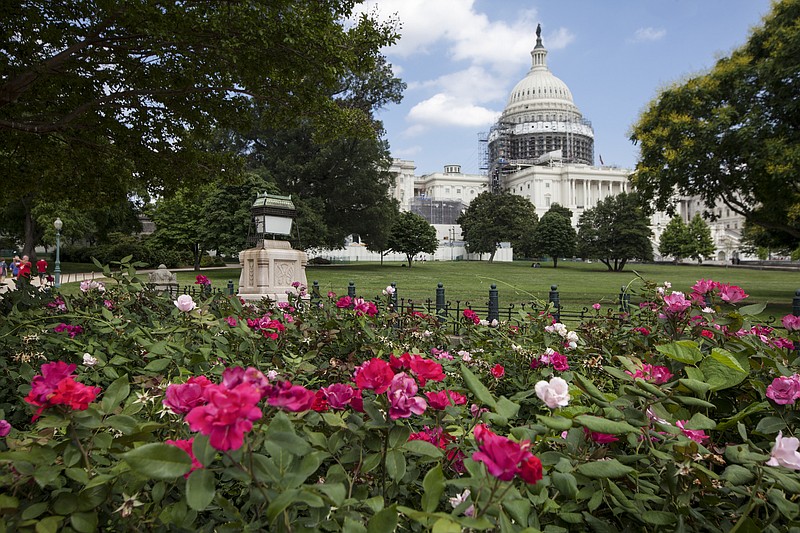 This June 16, 2016, file photo, shows an exterior view of the Capitol Building in Washington. The House is slated to vote Sept. 9 on a bipartisan bill that would allow families of Sept. 11 victims to sue the government of Saudi Arabia, setting the stage for a showdown with President Barack Obama on the eve of the 15th anniversary of the attacks. The Senate passed the bill in May by voice vote despite the strident objections from Saudi Arabia, a key U.S. ally in the Middle East. Fifteen of the 19 hijackers were Saudi nationals.