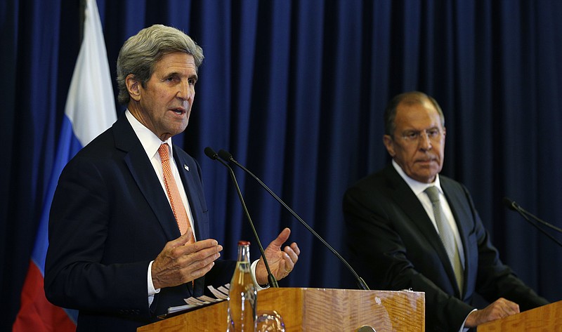 U.S. Secretary of State John Kerry and Russian Foreign Minister Sergey Lavrov hold a press conference following their meeting in Geneva, where they discussed the crisis in Syria, Friday, Sept. 9, 2016. (Kevin Lamarque/Pool Photo via AP)