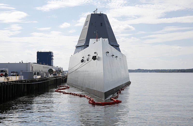 
              The USS Zumwalt sits at dock at the naval station in Newport, R.I., Friday, Sept. 9, 2016. The 610-foot-long warship has an angular shape to minimize its radar signature and cost more than $4.4 billion. It's the most expensive destroyer built for the Navy. (AP Photo/Michael Dwyer)
            