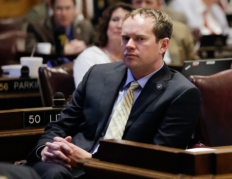 
              FILE - In this April 20, 2016, file photo, Rep. Jeremy Durham, R-Franklin, left, listens to a debate in the House of Representatives in Nashville, Tenn. Durham could become the first sitting lawmaker to become the subject of an ouster vote in the Tennessee General Assembly when a special legislative session kicks off on Monday, Sept. 12, 2016. (AP Photo/Mark Humphrey, File)
            