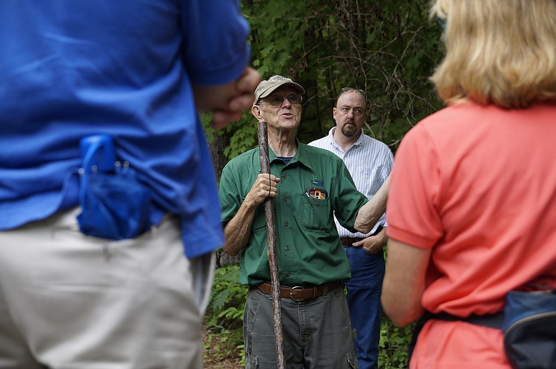 Bill Phillips, senior partner and ecologist at Envision Ecology, addresses Signal Mountain Planning Commission officials and community members during a site walk of the Hangstefer Property on Aug. 2. Phillips addressed officials and the community again during a Planning Commission meeting on Sept. 1 that discussed the endangered plant species on the property, which is slated for development. (Staff photo by Myron Madden)