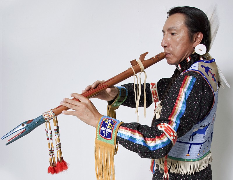 
              This undated photo provided by Michael Wolforth shows Dakota flute maker and player Bryan Akipa in Rapid City, S.D. Akipa, a member of the Sisseton Wahpeton Oyate tribe, is one of the recipients of the 2016 National Endowment for the Arts National Heritage Fellowship. (Michael Wolforth via AP)
            