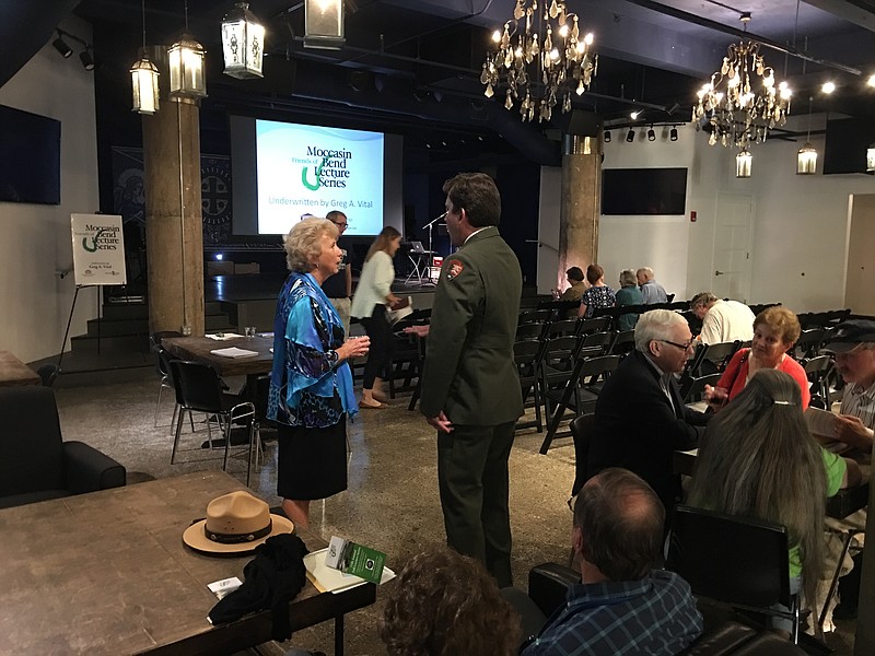 Former National Park Service Director Fran Mainella, left, speaks with Brad Bennett, superintendent of Chickamauga and Chattanooga National Military Park, prior to opening the 11th annual Friends of Moccasin Bend fall lecture series on Monday evening.