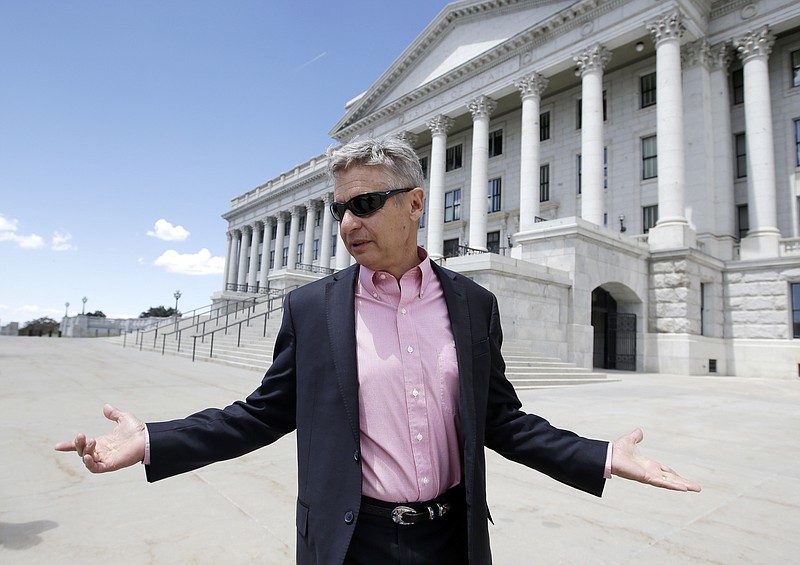
              FILE - In this May 18, 2016 file photo, Libertarian presidential candidate, former New Mexico Gov. Gary Johnson leaves the Utah State Capitol after meeting with with legislators, in Salt Lake City. The day after political heavyweight Mitt Romney name-dropped him on Twitter, the former New Mexico governor seemed to reveal a hole in his foreign-affairs knowledge when he was befuddled by an otherwise routine question about the Syrian city of Aleppo. (AP Photo/Rick Bowmer, File)
            