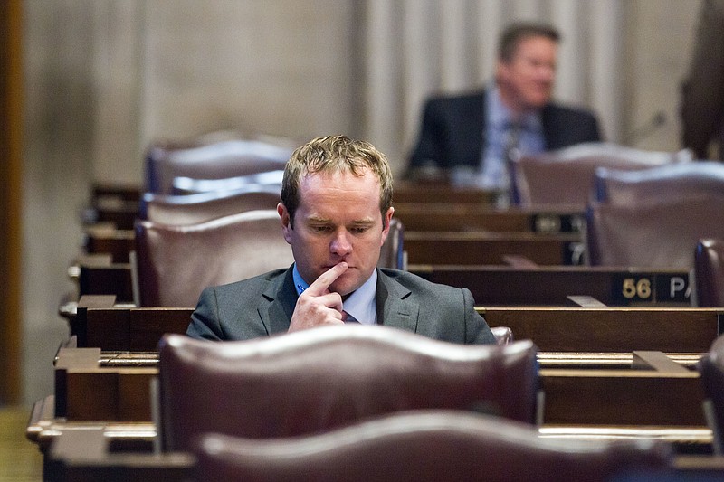 Former Rep. Jeremy Durham, R-Franklin, attends a House floor session in Nashville, Tenn., on Tuesday, Sept. 13, 2016. Tennessee lawmakers ousted Durham following an attorney general's investigation that detailed allegations of improper sexual contact with at least 22 women over the course of his four years in office. (AP Photo/Erik Schelzig)
            