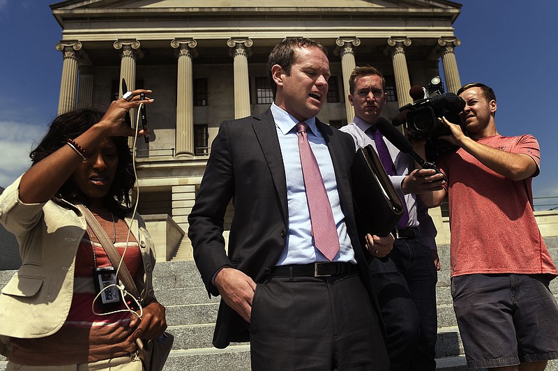 Rep. Jeremy Durham of Franklin talks to reporters as he leaves the Capitol before a vote to expel him from the House of Representatives was taken during a special session Tuesday Sept. 13, 2016, in Nashville, Tenn. Forty seven Republicans were joined by 23 Democrats Tuesday to vote to oust Durham from the Tennessee state Legislature. Durham faced allegations of sexual harassment detailed in a state attorney general's report. He denied most of them. 